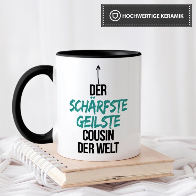 Tasse mit Spruch - Du bist der sch&auml;rfste, geilste Cousin der Welt - Innen &amp; Henkel Schwarz